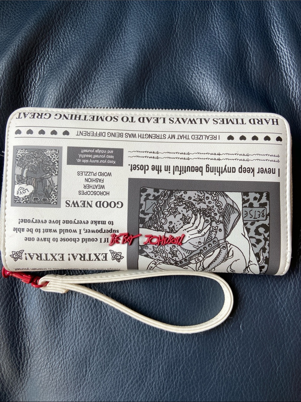 Betsey Johnson White Newspaper-Print Wristlet with Red Logo Accent